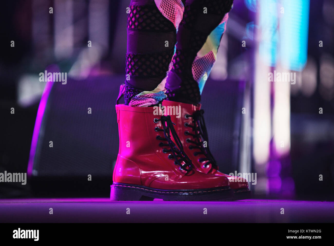 A red pair of boots from the famous British footwear brand Dr
