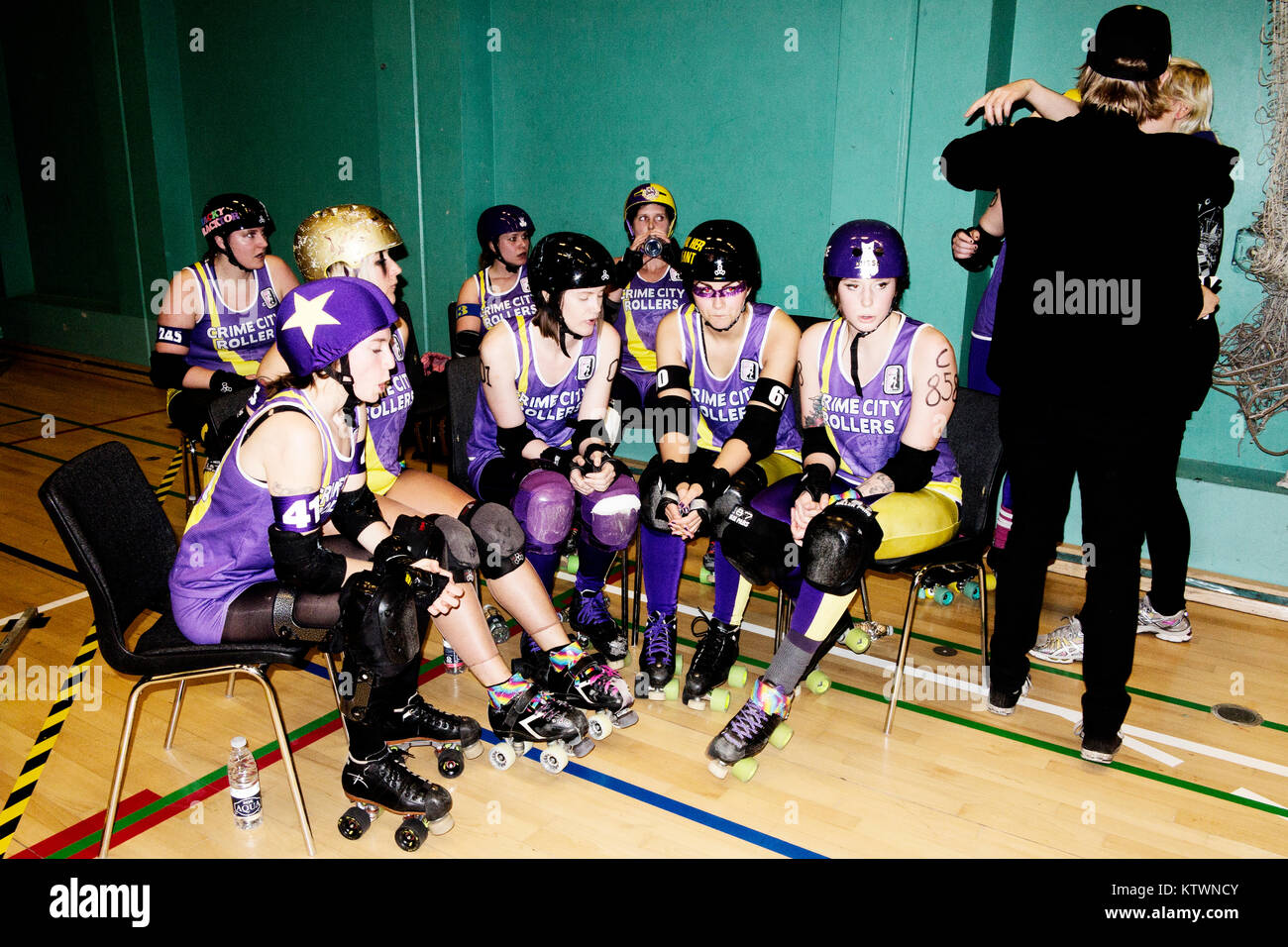 The Roller Derby team players in their roller skates getting ready for