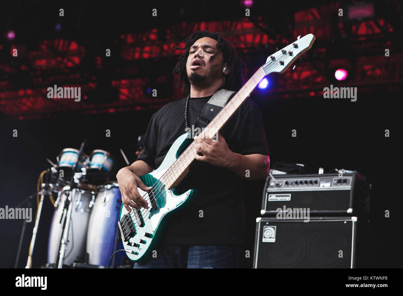 The American hip hop, rap and soul band The Roots performs a live concert at Roskilde Festival 2012. Here the musician and bassist Mark Kelley is pictured live on stage. Denmark, 07/07 2012. Stock Photo