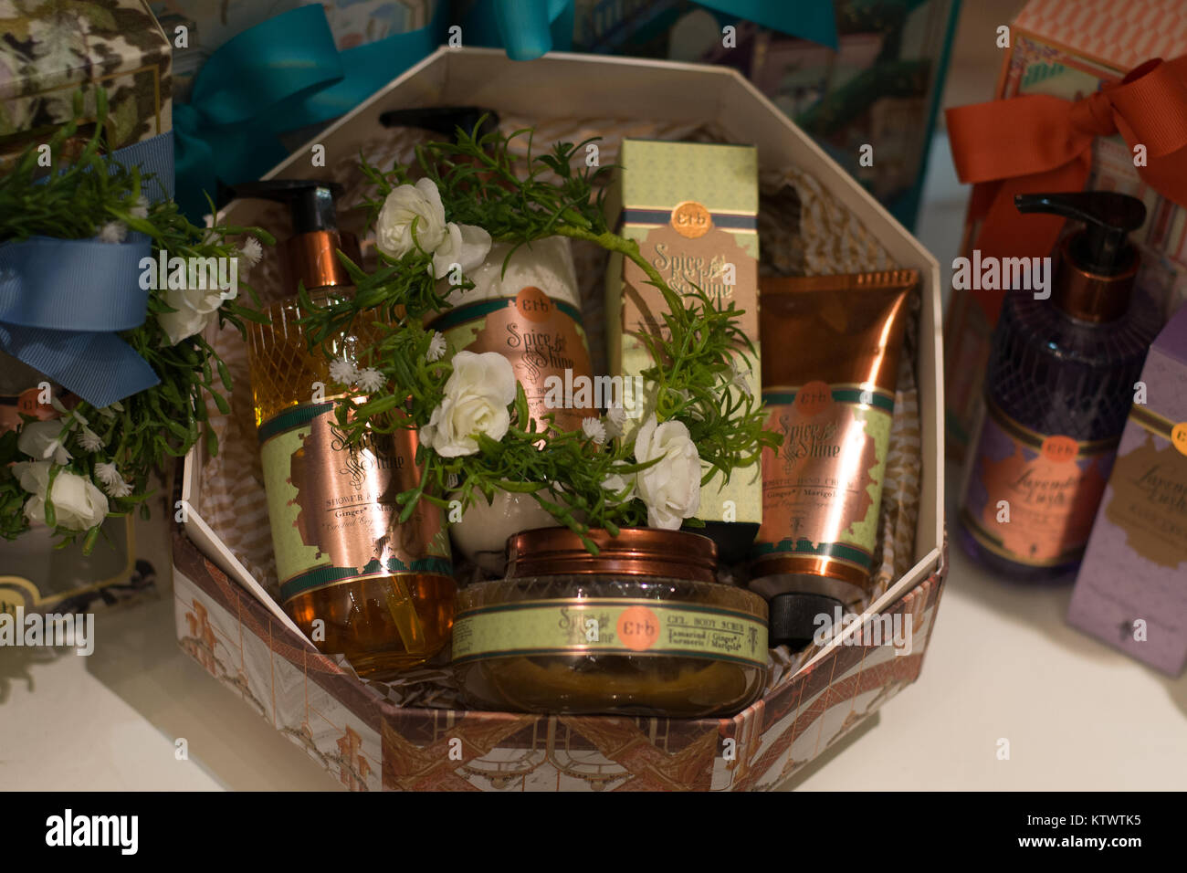 Spa and beauty products hampers on display on sheleves for sale in