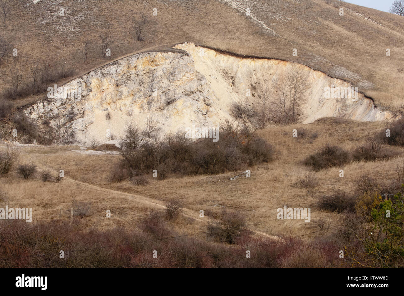 Abandoned quarry or surface mine, damaged landscape Stock Photo