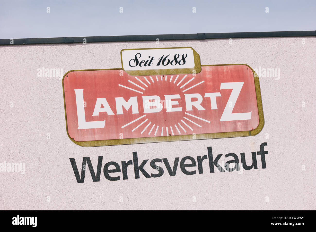Lambertz Logo on a factory building. The Lambertz Group is a Aachener Printen- and chocolate factory founded by Henry Lambertz 1688 and a manufacture Stock Photo