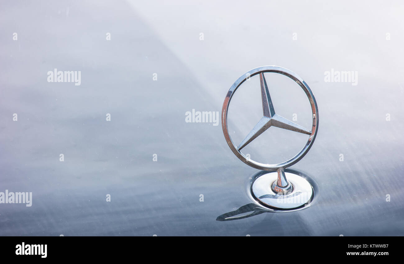 Mercedes Benz logo close up on a car grill. Mercedes-Benz is a German automobile manufacturer. The brand is used for luxury automobiles, buses Stock Photo