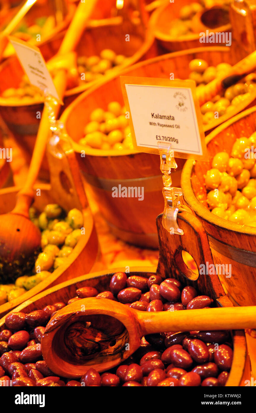 a variety of different and unusually flavoured and stuffed olives on