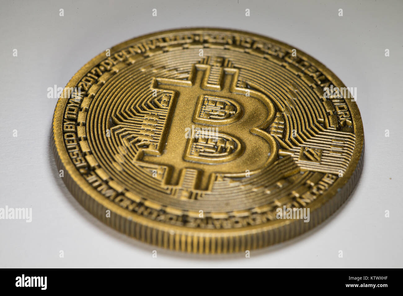 Gold Bitcoin coin on a white background Stock Photo - Alamy