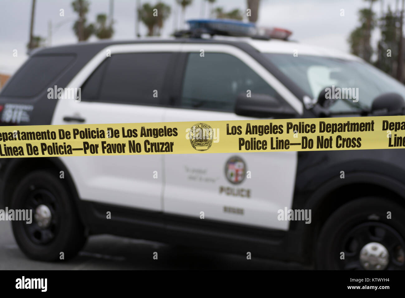 Los Angeles Police SUV and police tape at crime scene. Stock Photo