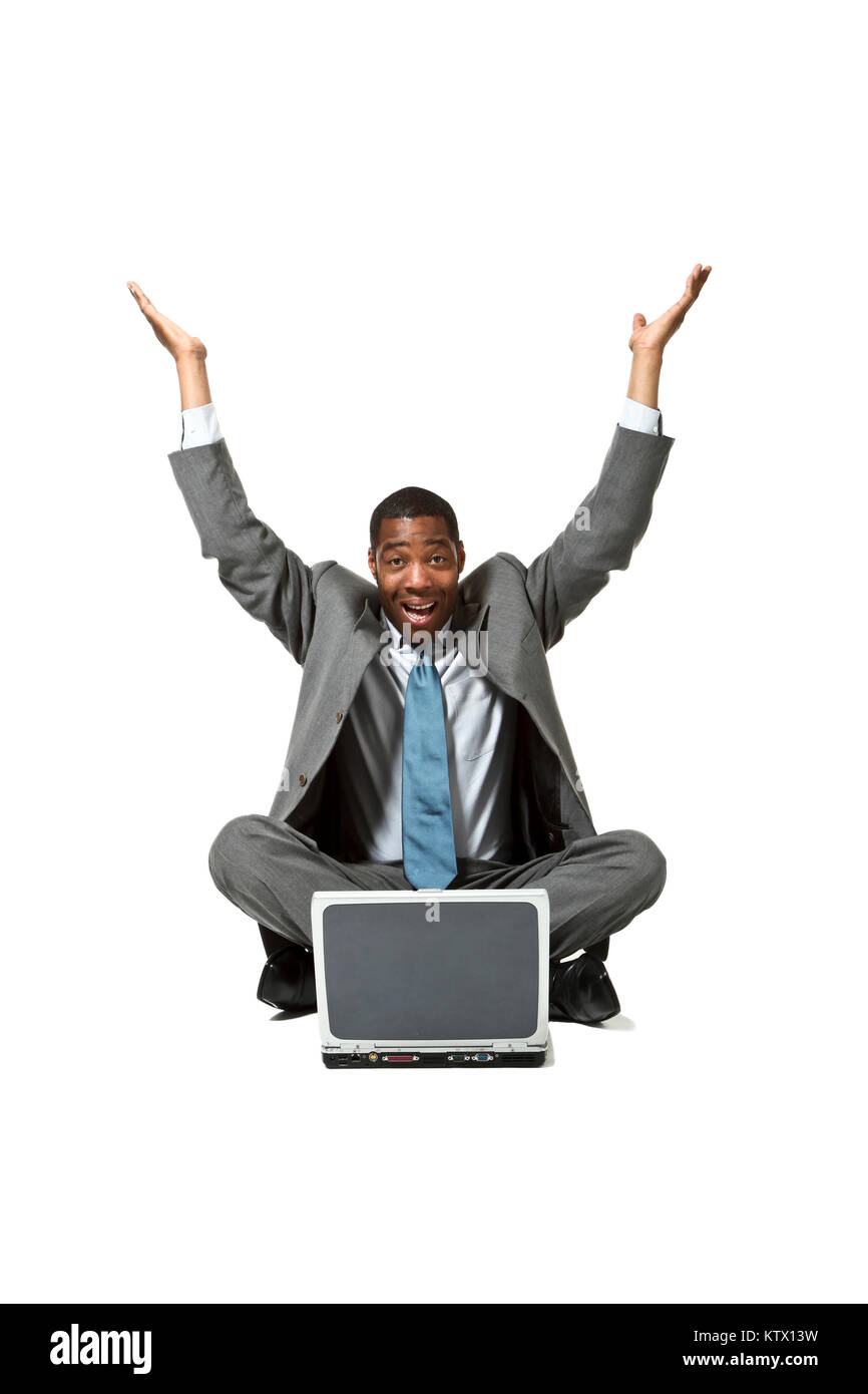 portrait of black businessman with laptop over white background Stock Photo