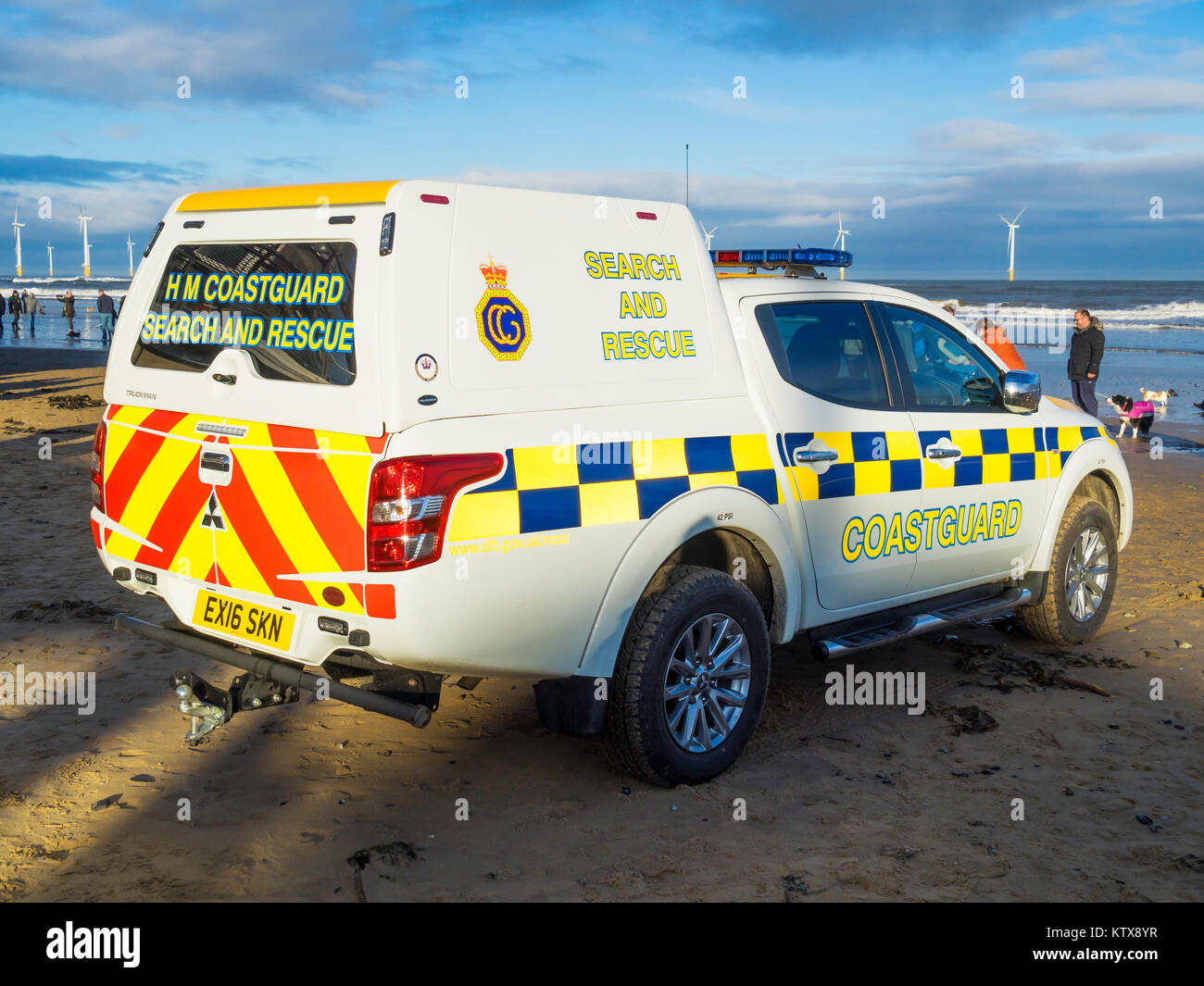 Coastguard Search and Rescue vehicle on the Beach at Redcar during the annual Boxing Day Charity Dip when people in fancy dress go into the North Sea Stock Photo
