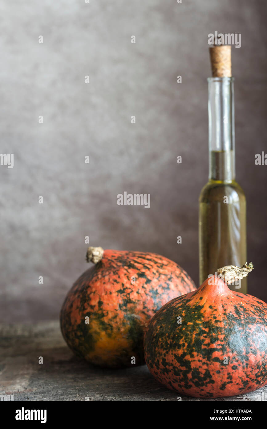 Two hokkaido pumpkins on the wooden background Stock Photo - Alamy