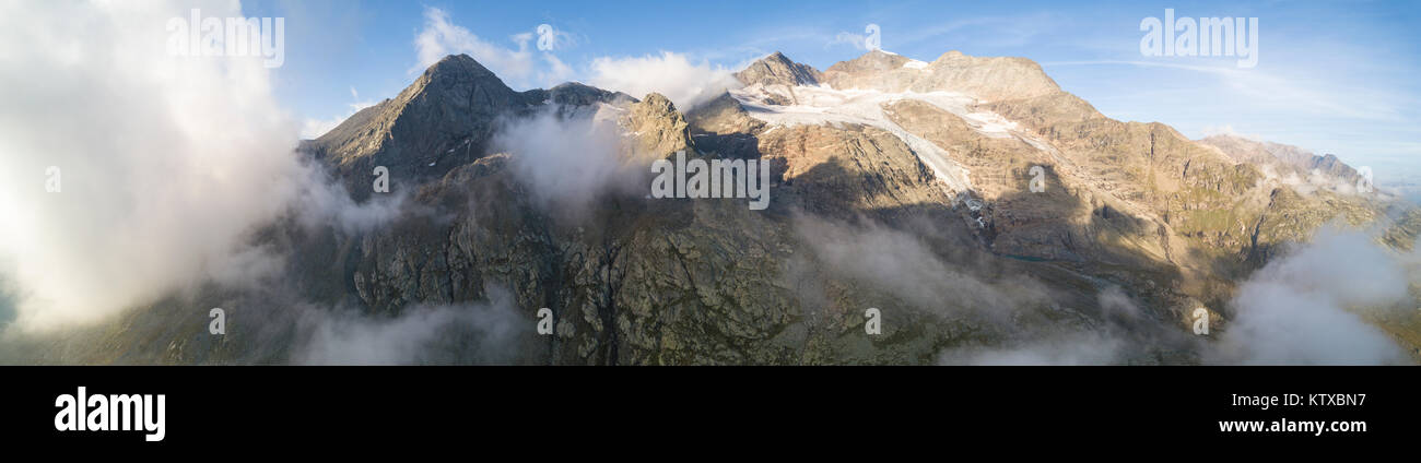Panoramic of Piz Arlas, Cambrena, Caral at dawn Bernina Pass, Poschiavo Valley, Engadine, Canton of Graubunden, Switzerland, Europe Stock Photo