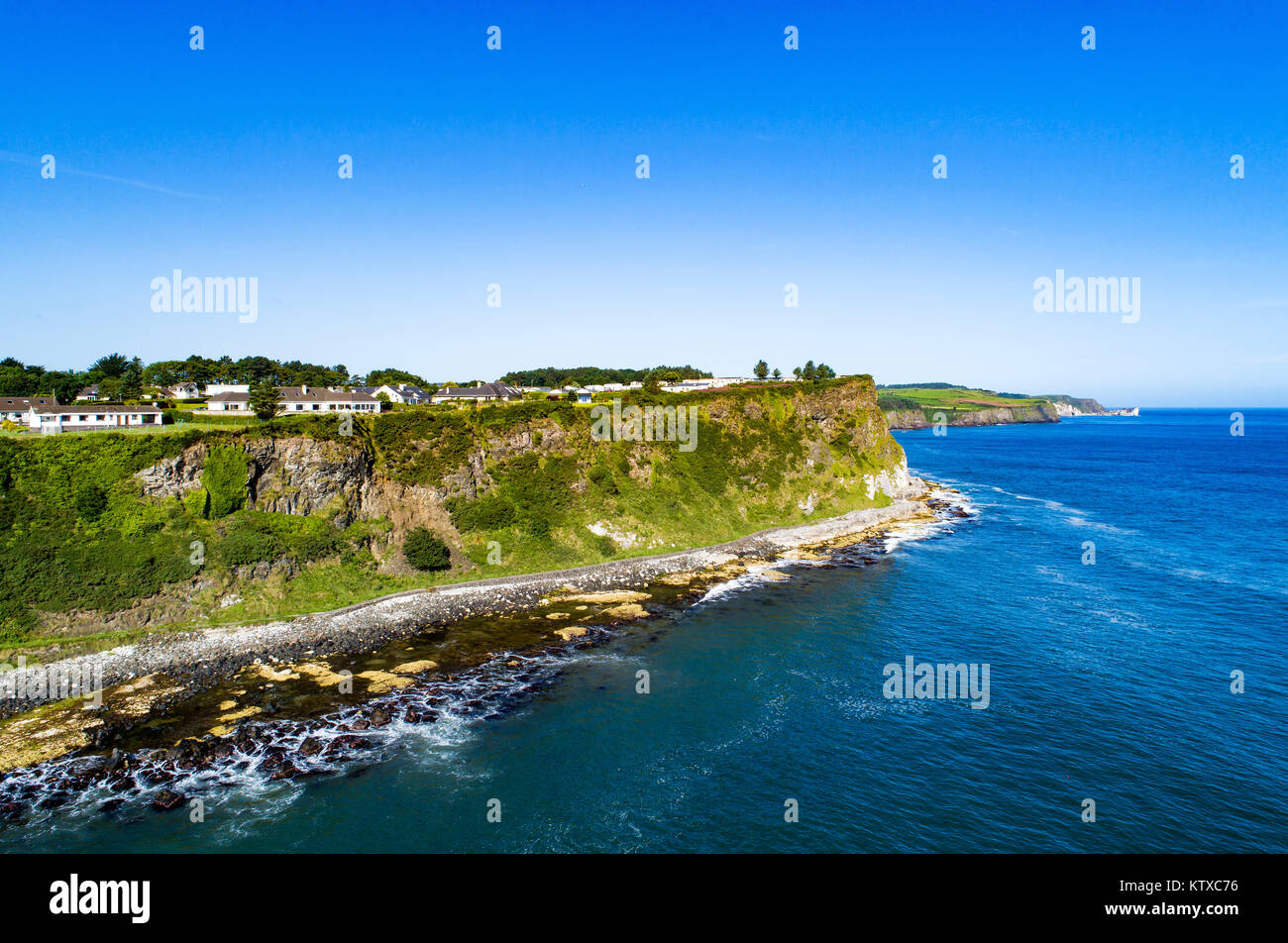 Atlantic coast with steep cliffs at Ballycastle, County Antrim, Northern Ireland, UK. Aerial view Stock Photo