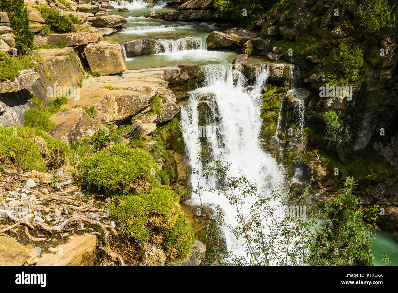 Steps of limestone strata make a waterfall on the Rio Arazas, upper Ordesa Valley, Ordesa National Park, Pyrenees, Aragon, Spain, Europe Stock Photo