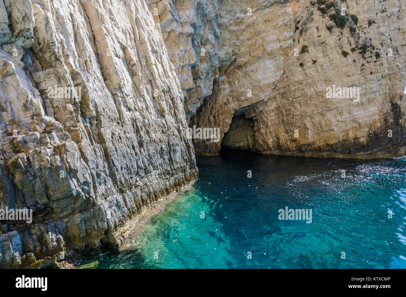 entrance of caves in the ionian sea greece Stock Photo