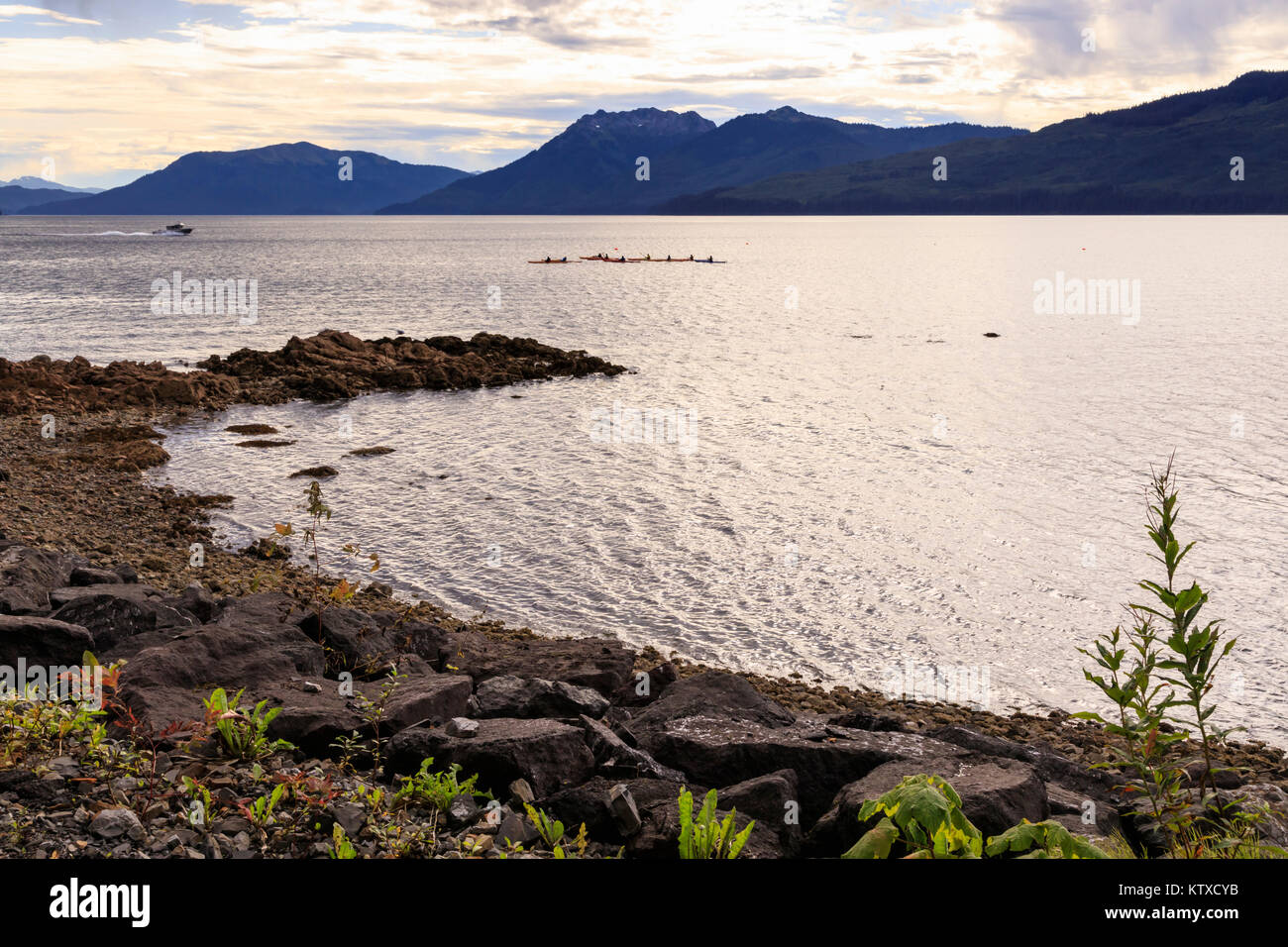 Icy Strait Point, near Hoonah, shore and kayaks, distant mountains, summer, Chichagof Island, Inside Passage, Alaska, United States of America, North  Stock Photo