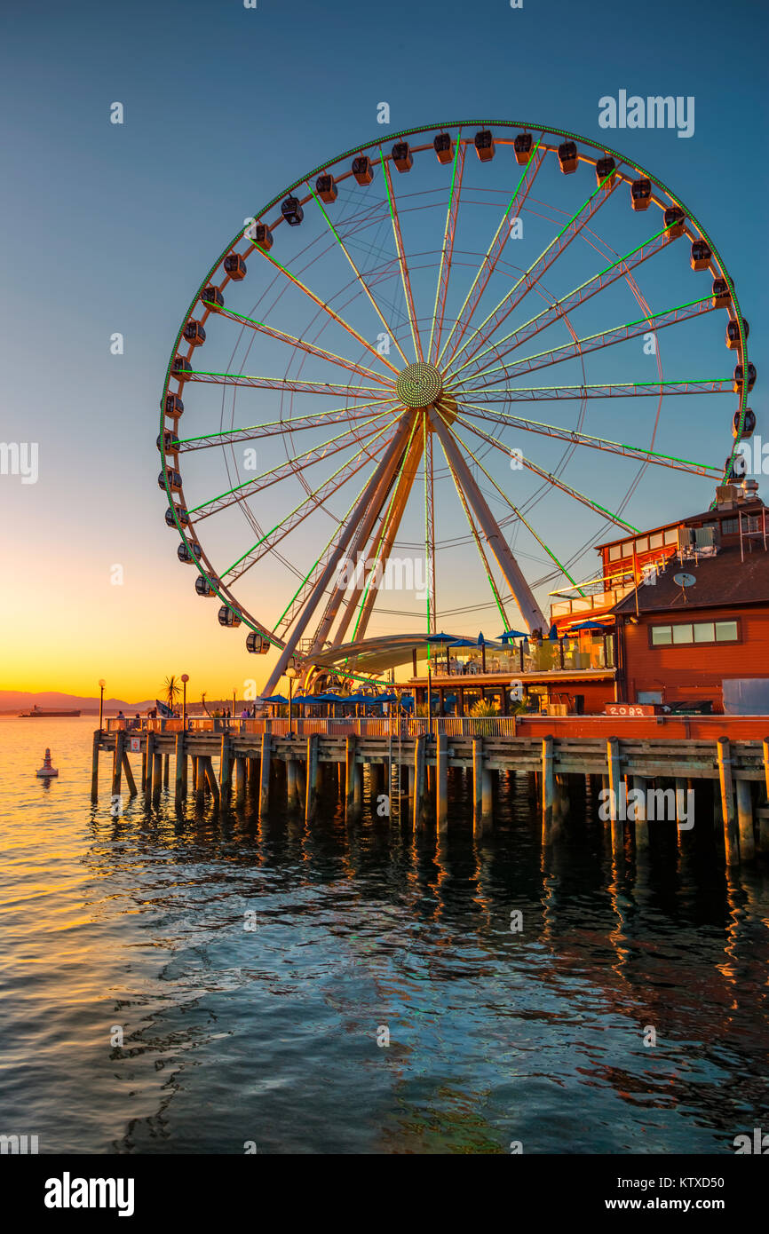 Seattle's Great Wheel on Pier 57 at golden hour, Seattle, Washington State, United States of America, North America Stock Photo