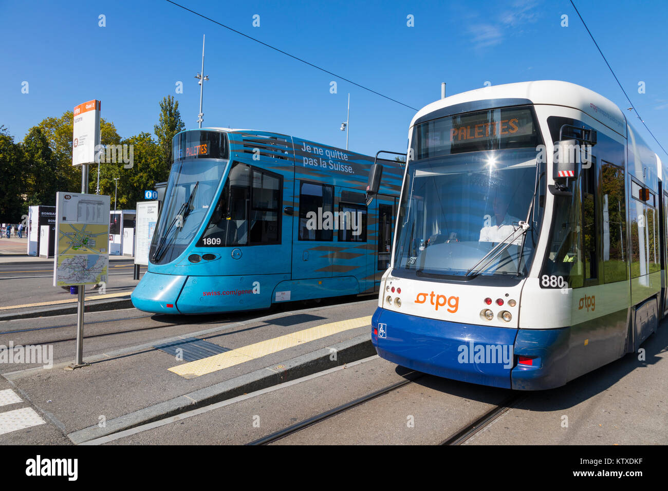 Flexity Outlook Cityrunner on right and Tango on left, trams at Place des Nations, Geneva, Switzerland, Europe Stock Photo