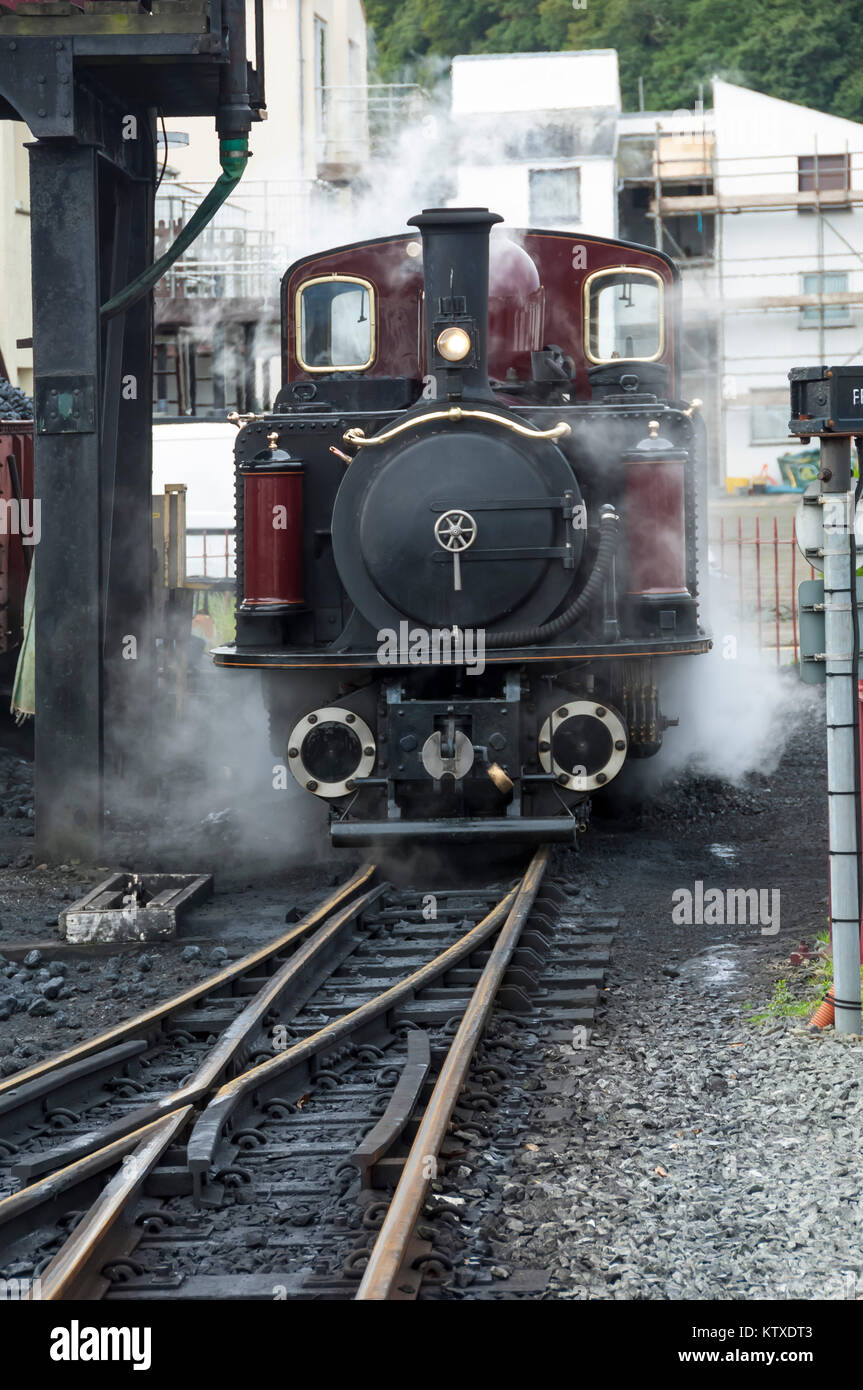 Narrow gauge Blaenau Ffestiniog railway station engine taking water and
