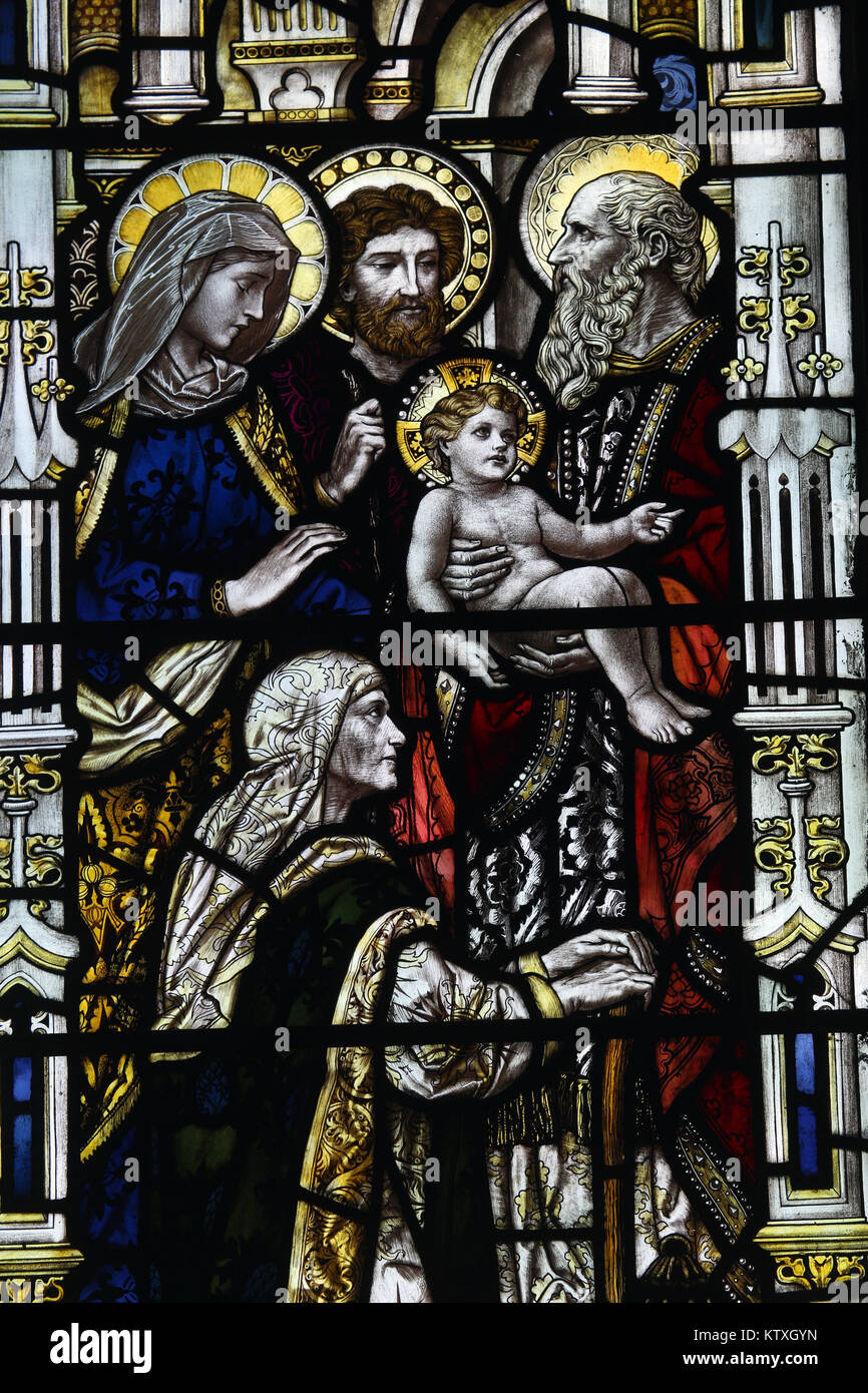 Stained glass window by Powell & Sons depicting Presentation in the temple, St Mary's Church, Stratford St Mary, Suffolk, England; Stock Photo