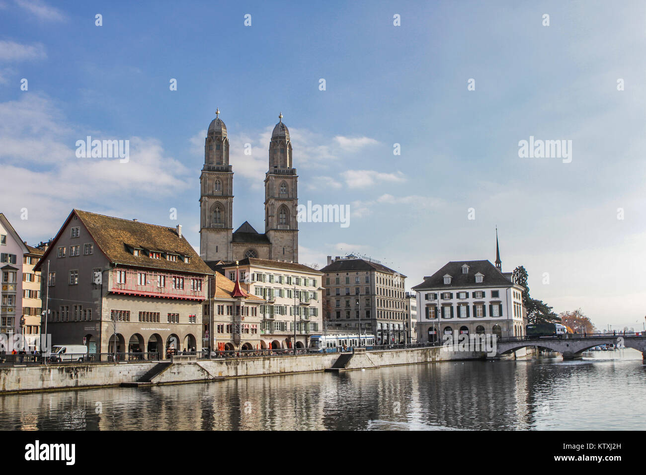 old town of Zurich or Zürich, Switzerland, view to Limmatquai with protestant church Grossmünster and Limmat river Stock Photo