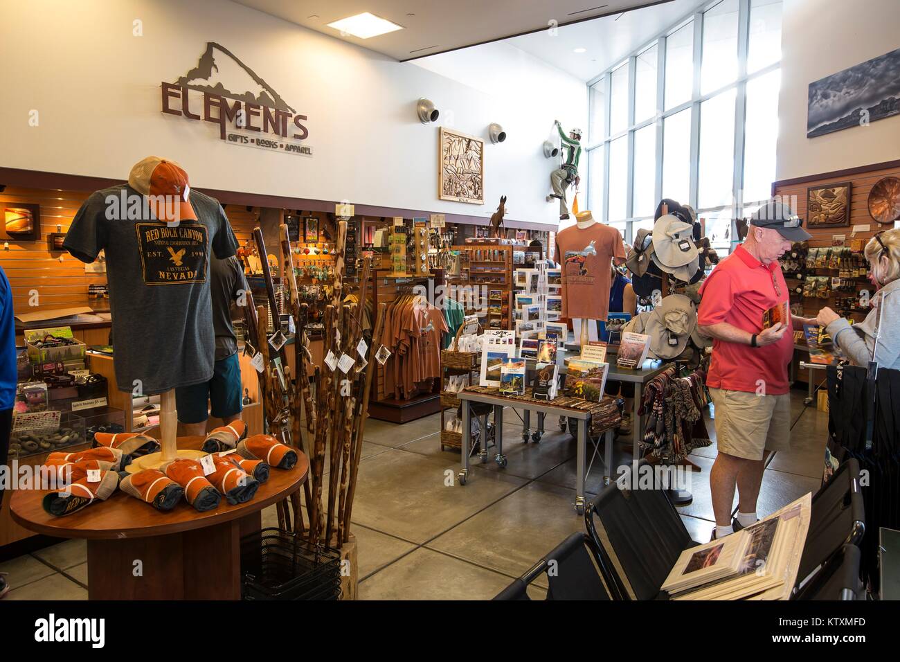 Tourists shop at the gift shop at the Red Rock Canyon Visitor Center in the Red Rock Canyon National Conservation Area October 2, 2016 near Las Vegas, Nevada. Stock Photo
