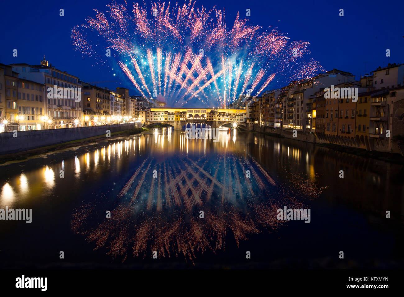 Explosive fireworks around Ponte Vecchio on River Arno Celebrating