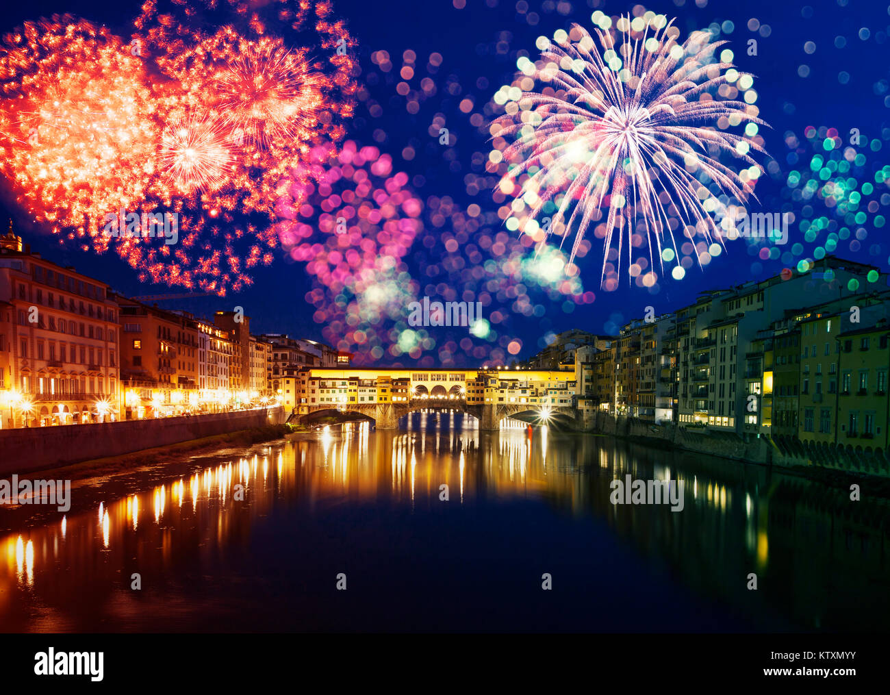 Explosive fireworks around Ponte Vecchio on River Arno Celebrating