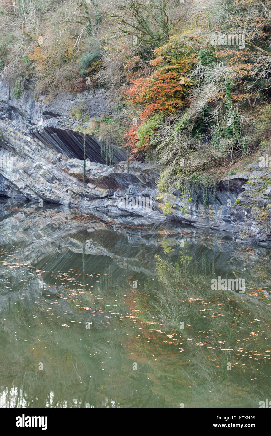 Meldon Quarry lake and remarkable shelf of rock Stock Photo Alamy