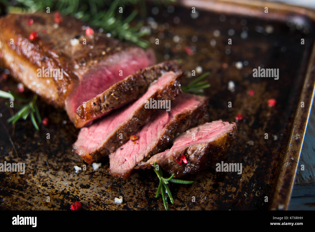 Grass Fed Steak Roasted to Medium Rare Stock Photo
