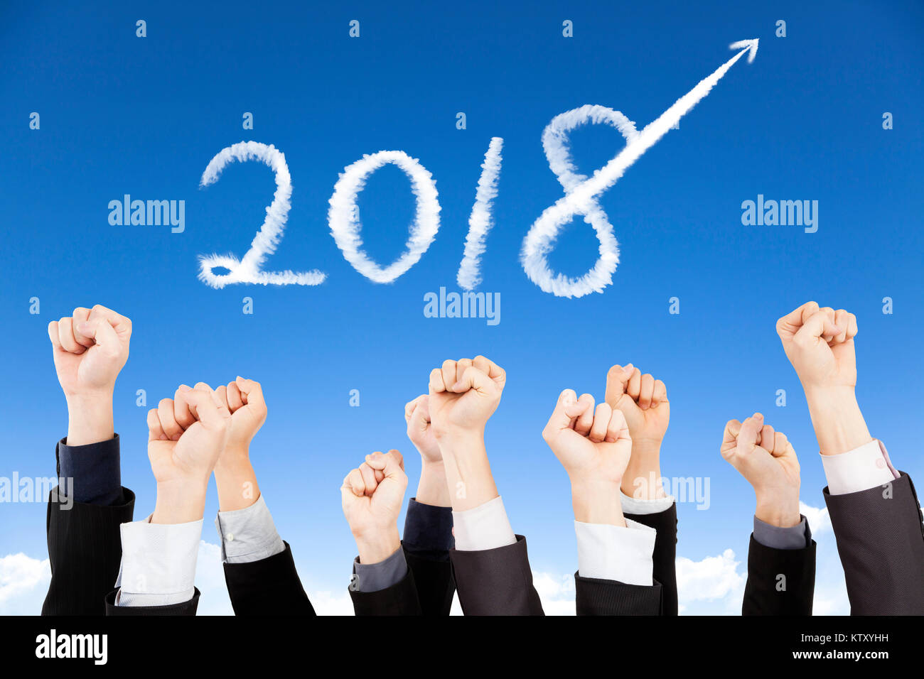 business people showing fist with 2018 year concept Stock Photo