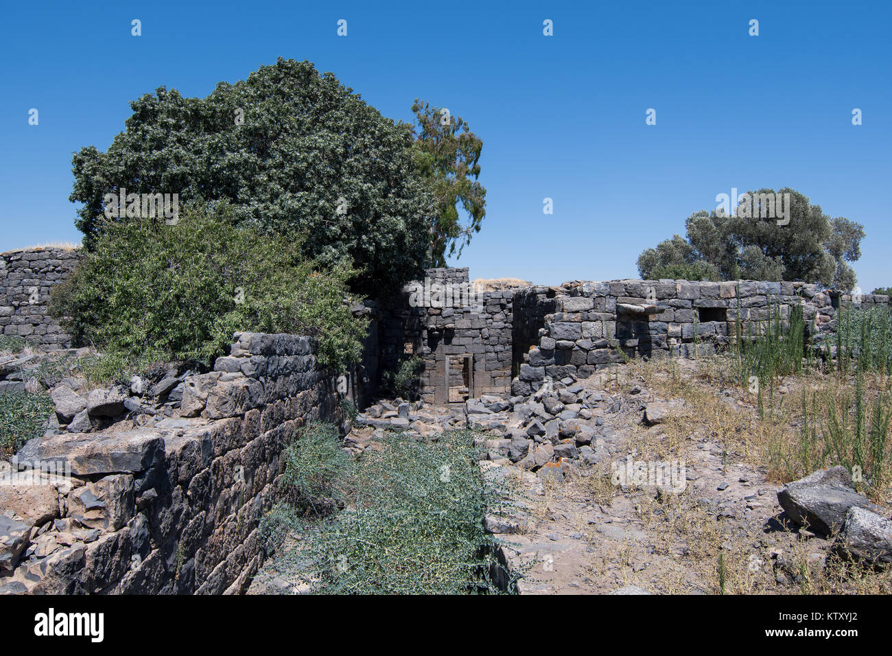 Entrance to a building of basalt related to the Christian town of Deir ...