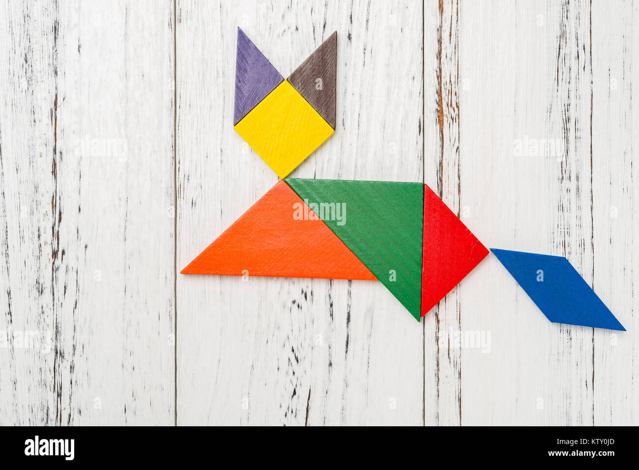 wooden tangram shaped like a fox Stock Photo - Alamy