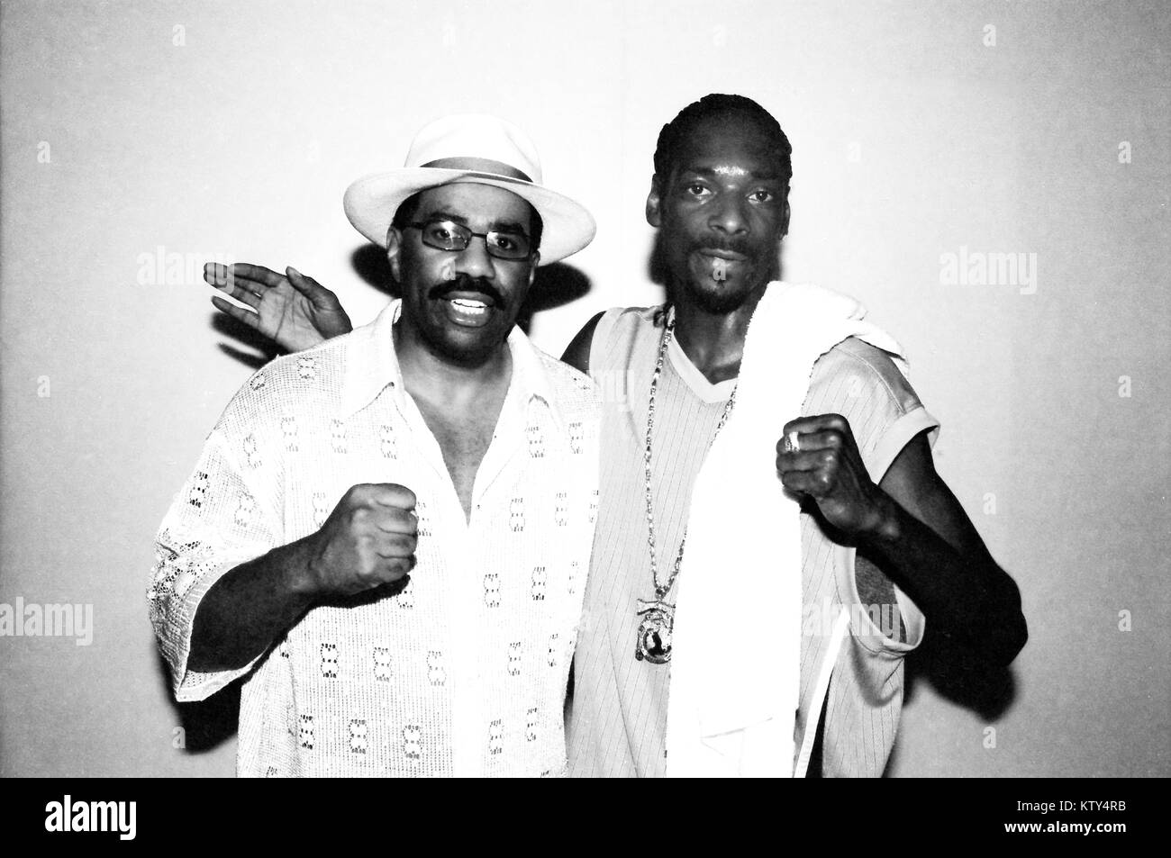 IRVINE, CA - 2002: Steve Harvey and Snoop Dogg pictured at stand up performance in Irvine, California in 2002. Credit: Pat Johnson/MediaPunch Stock Photo