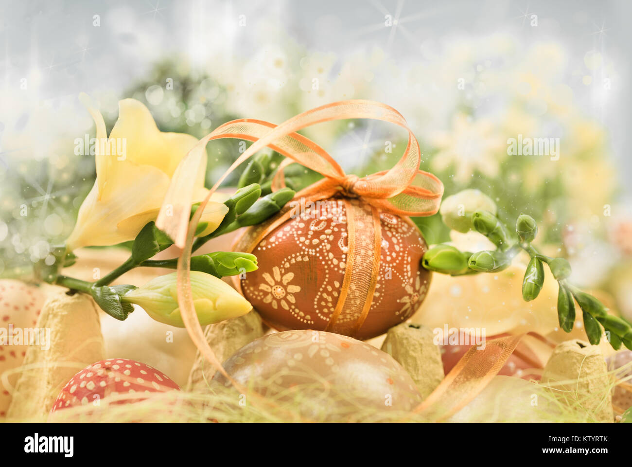 Easter composition with eggs and spring flowers, shallow DOF, text ...