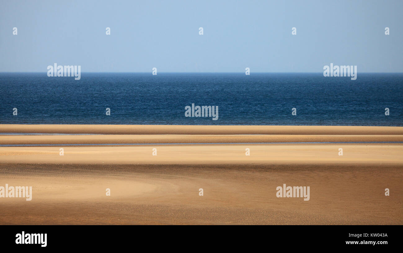 Sandy beach at Burnham Overy on the North Norfolk coast. Stock Photo