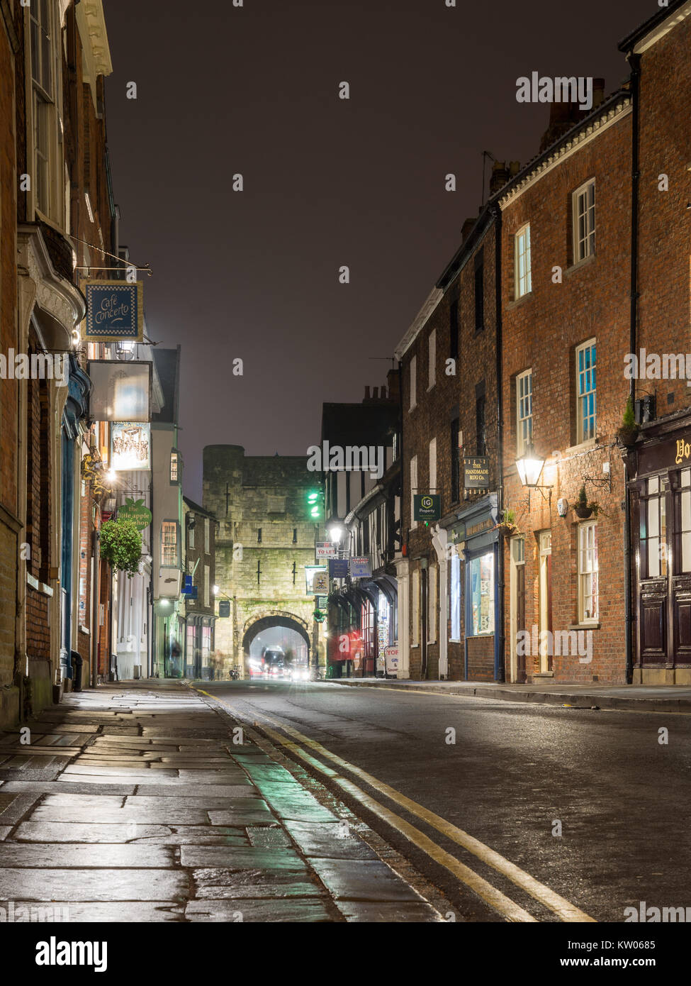York, England, UK - January 27, 2017: High Petergate, a traditional terraced street of houses and shops, leads to Petergate in York's mediaeval city w Stock Photo