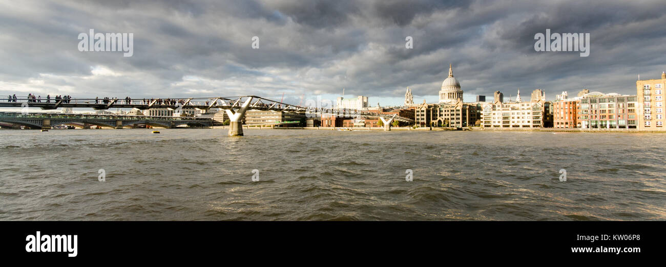 London, England, UK - October 25, 2014: Afternoon sun shines on the dome of St Paul's Cathedral and other buildings of the City of London beside the M Stock Photo