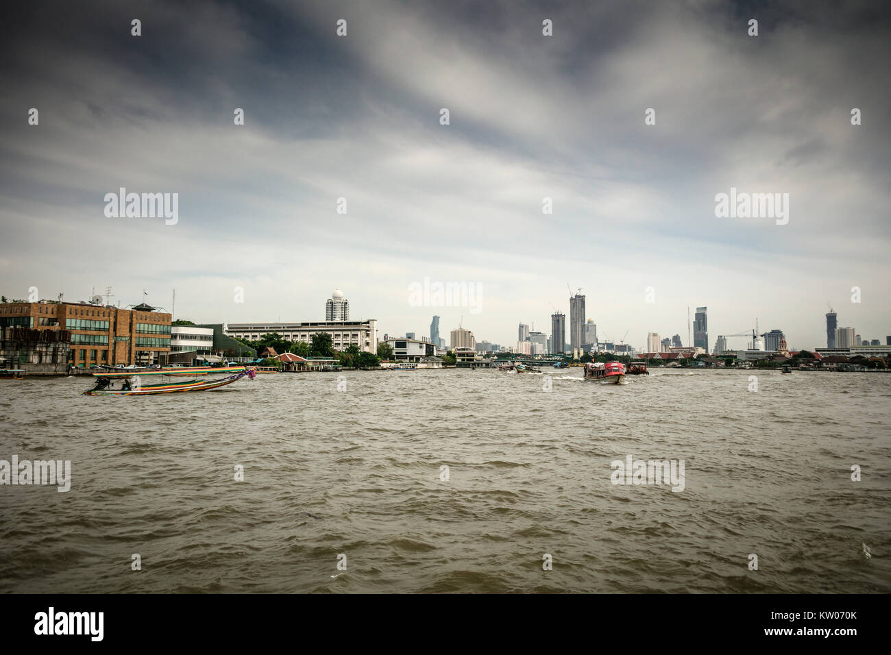 River traffic and skyline, Chao Phraya River, Bangkok, Thailand Stock ...