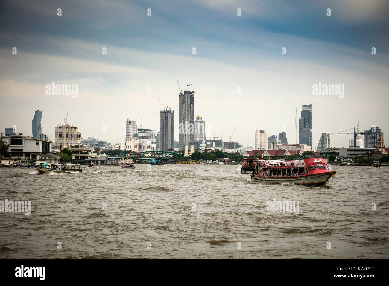 River traffic and skyline, Chao Phraya River, Bangkok, Thailand Stock ...