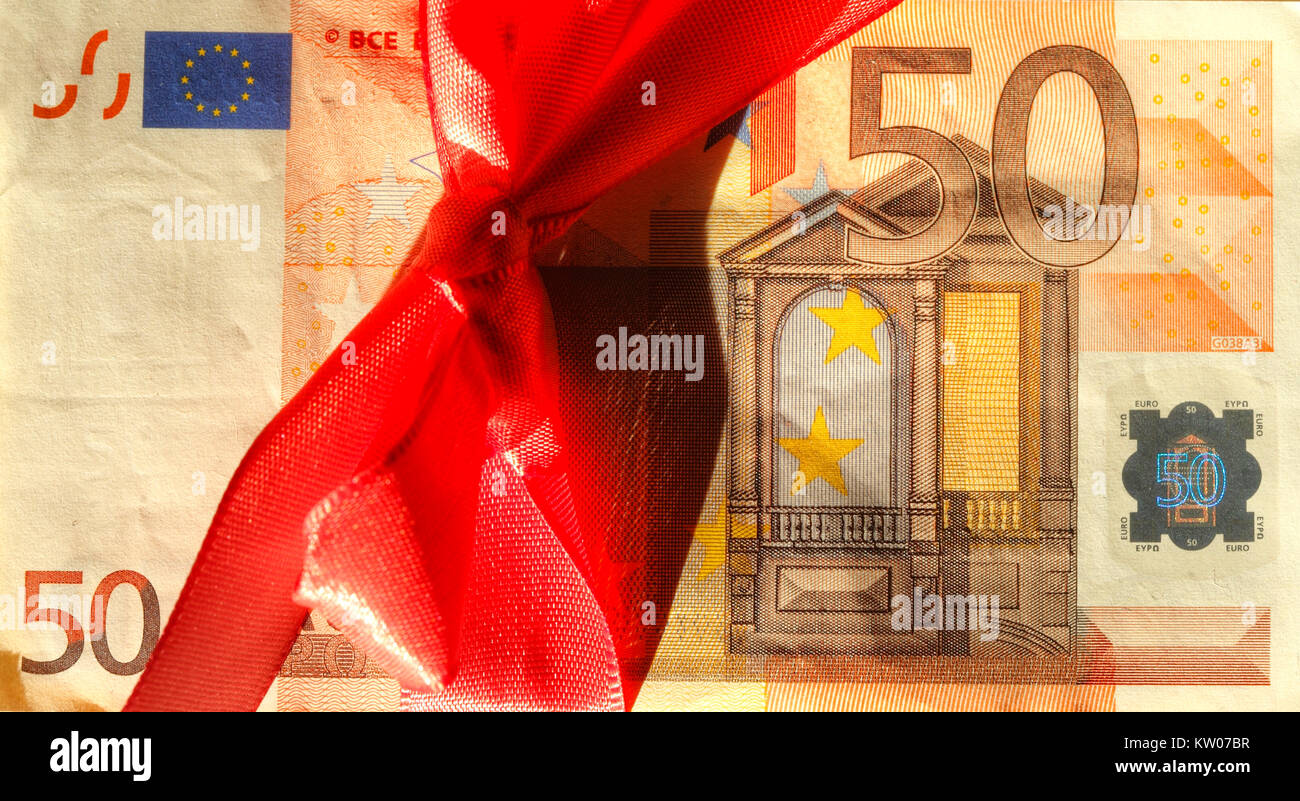 Fifty Euros Banknote with red loop as gift of money Stock Photo