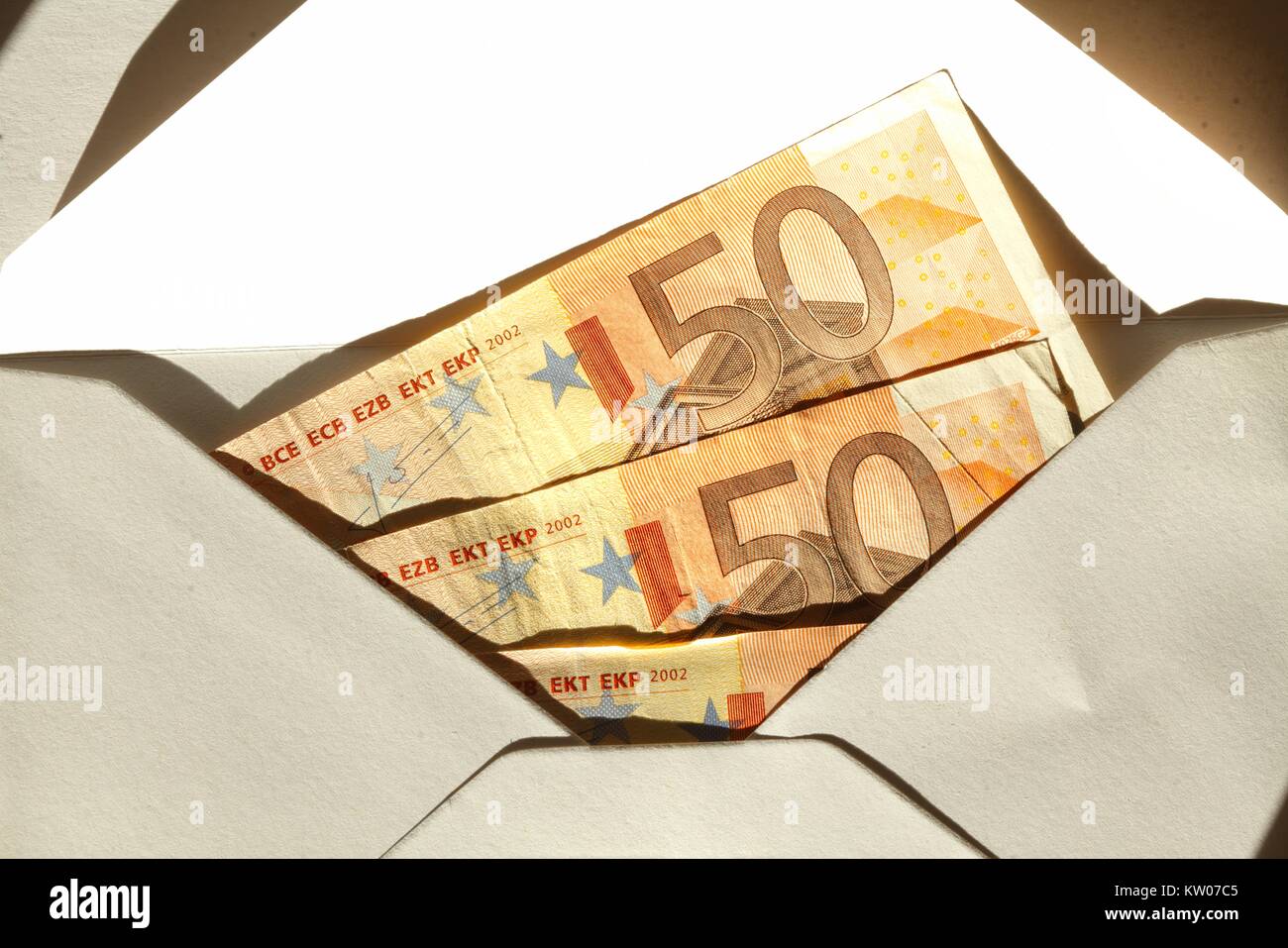 Fifty Euros Banknotes in a envelope as gift of money Stock Photo