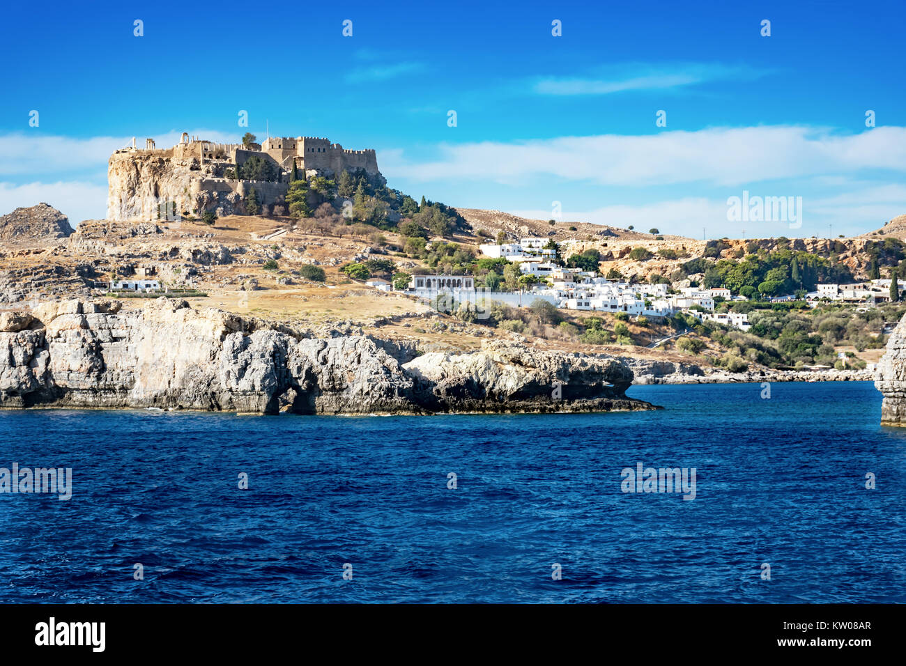 Acropolis of Lindos and village of Lindos, view from sea (Rhodes ...