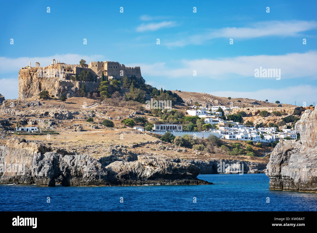 Acropolis of Lindos and village of Lindos, view from sea (Rhodes ...