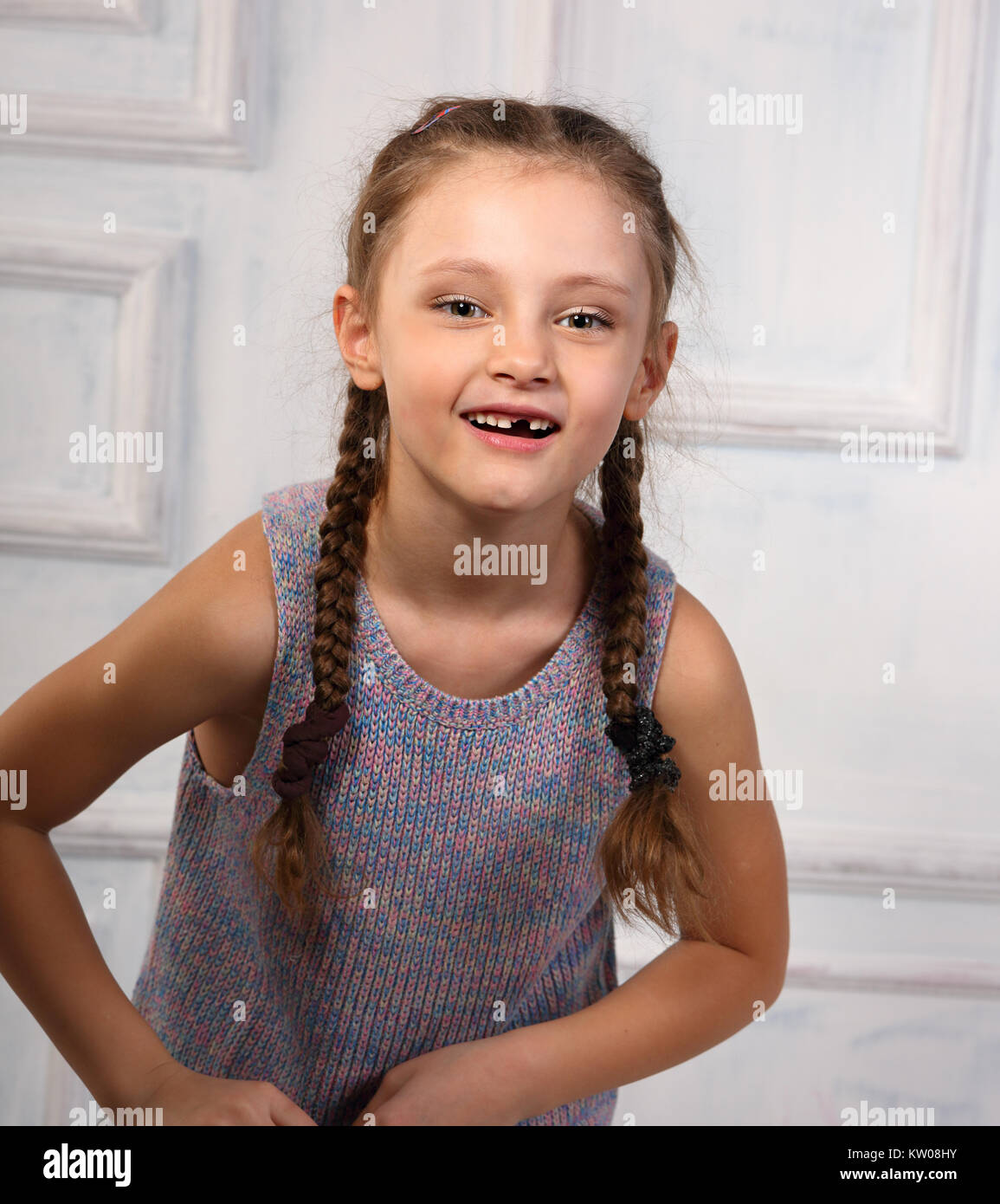 Fun Emotional Kid Girl Without Milk Tooth Posing In Fashion Blouse