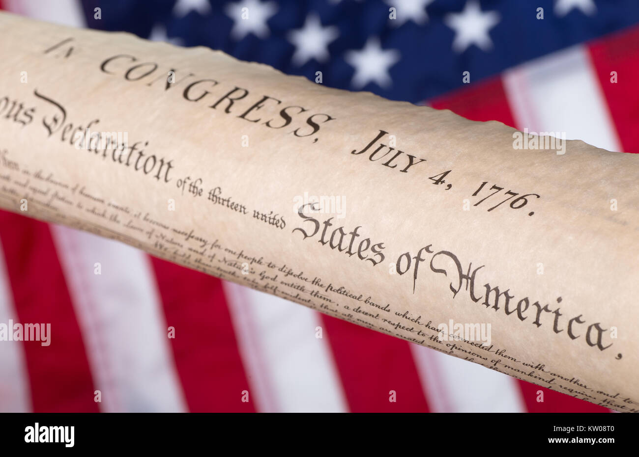 Declaration of independence with United States flag in background Stock Photo