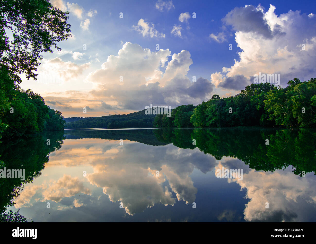 Clouds reflect in a lake hi-res stock photography and images - Alamy