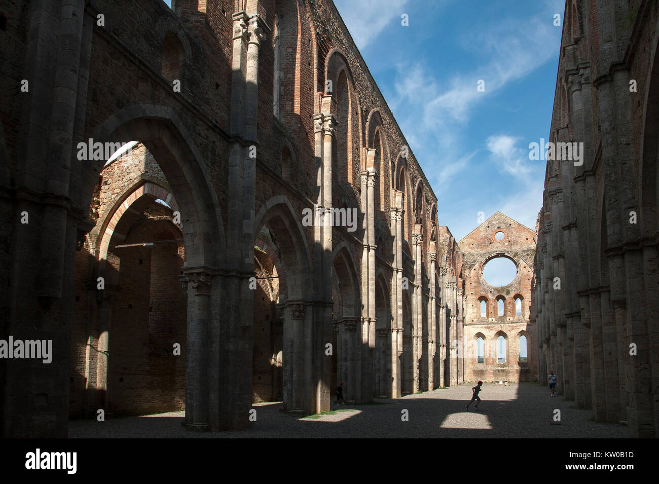 Ruined Italian Gothic Abbazia di San Galgano (Abbey of San Galgano) from XIII century was one of the richest and most powerful monasteries in XIII and Stock Photo