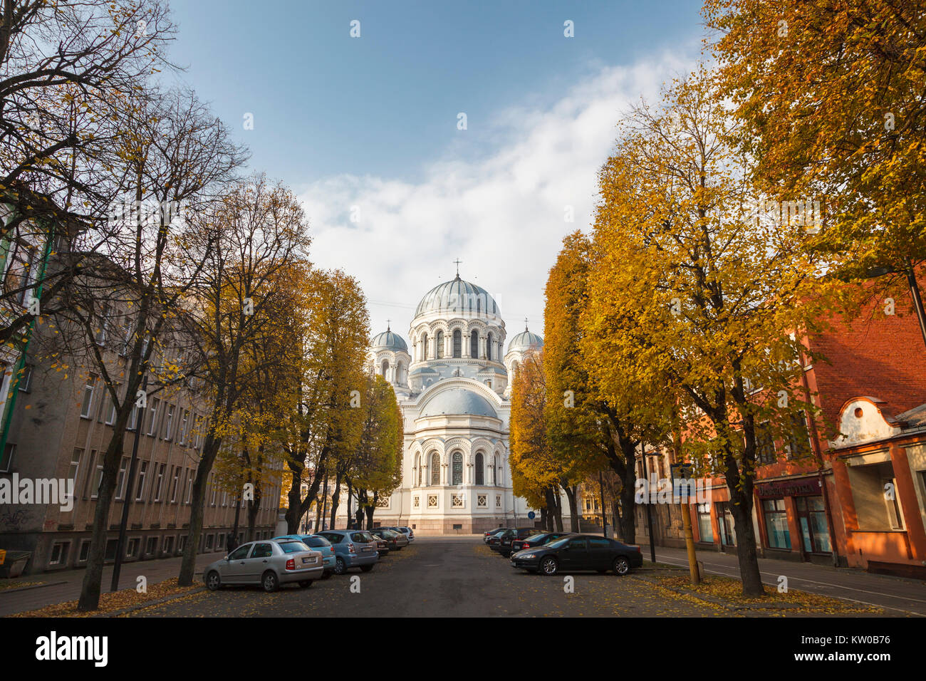 Exterior of domed St. Michael the Archangel Church (Garrison Church) in tree-lined Laisves Aleja, Kaunas, the second city of Lithuania in autumn Stock Photo