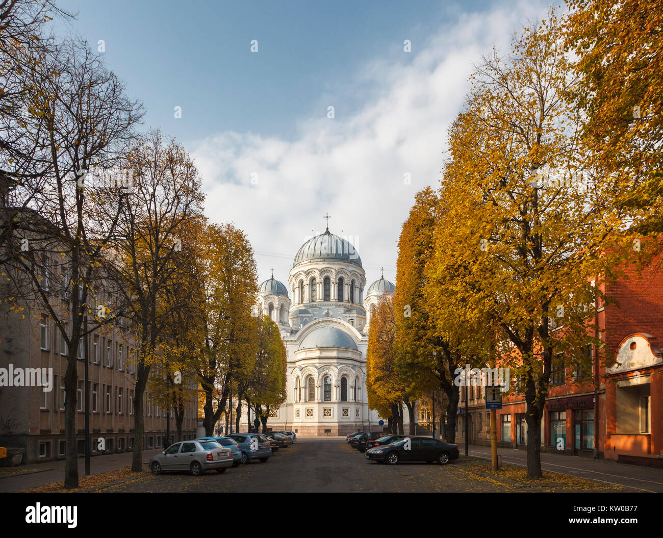 Exterior of domed St. Michael the Archangel Church (Garrison Church) in tree-lined Laisves Aleja, Kaunas, the second city of Lithuania in autumn Stock Photo