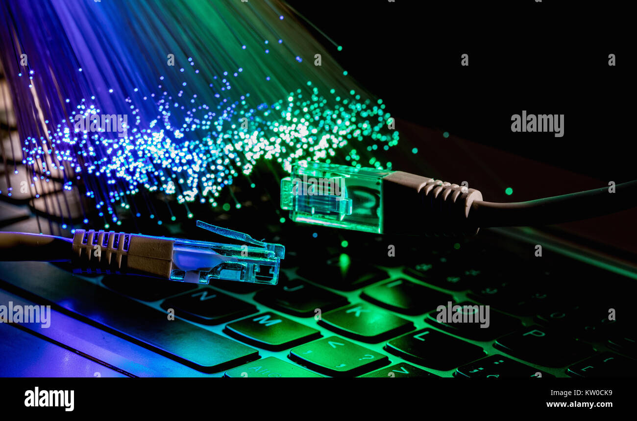 network cable closeup with fiber optical background, color fiber ...