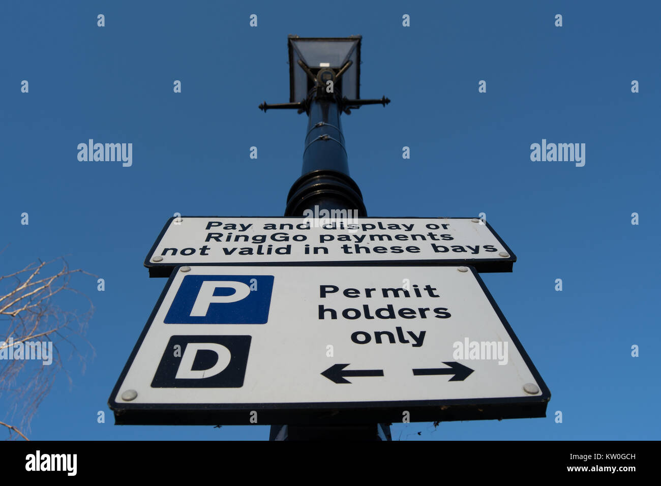 road sign indicating parking for permit holders only and stating pay and display and ringgo payments are not valid, in twickenham, middlesex, england Stock Photo